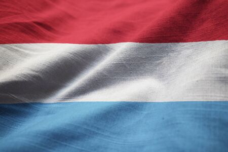 Closeup of Ruffled Luxembourg Flag, Luxembourg Flag Blowing in Windの写真素材