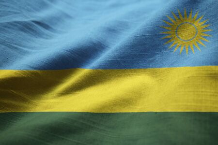 Closeup of Ruffled Rwanda Flag, Rwanda Flag Blowing in Windの写真素材