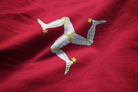 Closeup of Ruffled Isle of Mann Flag, Isle of Mann Flag Blowing in Windの写真素材