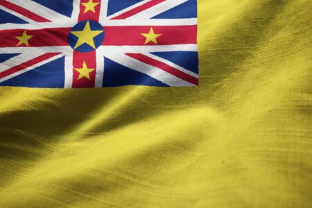 Closeup of Ruffled Niue Flag, Niue Flag Blowing in Windの写真素材