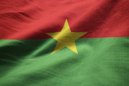 Closeup of Ruffled Burkina Faso Flag, Burkina Faso Flag Blowing in Windの写真素材