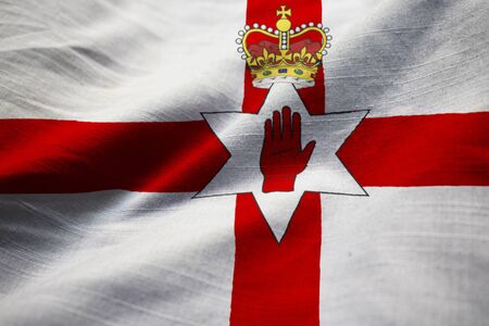 Closeup of Ruffled Northern Ireland Flag, Northern Ireland Flag Blowing in Windの写真素材