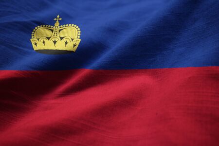 Closeup of Ruffled Liechtenstein Flag, Liechtenstein Flag Blowing in Windの写真素材