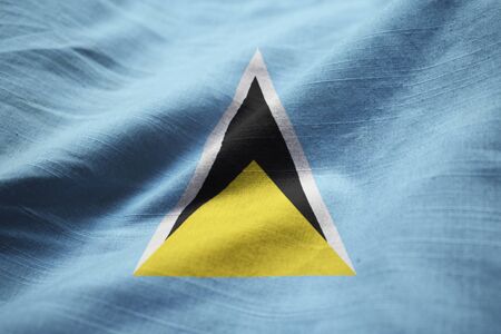 Closeup of Ruffled Saint Lucia Flag, Saint Lucia Flag Blowing in Windの写真素材