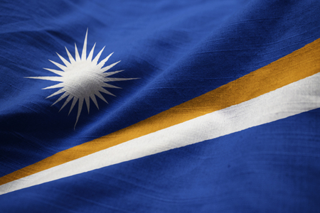 Closeup of Ruffled Marshall Islands Flag, Marshall Islands Flag Blowing in Windの写真素材