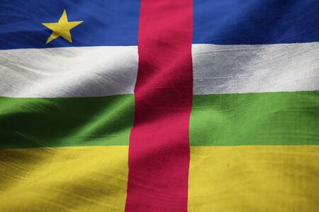 Closeup of Ruffled Central African Republic Flag, Central African Republic Flag Blowing in Windの写真素材