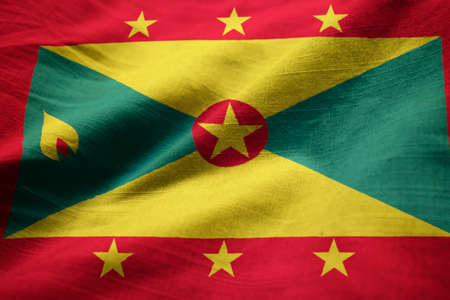 Closeup of Ruffled Grenada Flag, Grenada Flag Blowing in Windの写真素材
