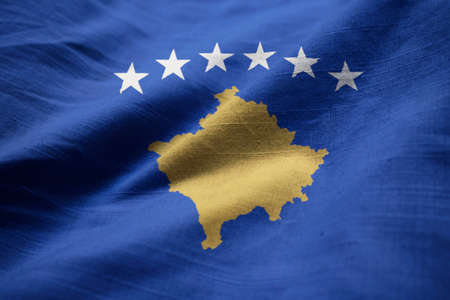 Closeup of Ruffled Kosovo Flag, Kosovo Flag Blowing in Windの写真素材