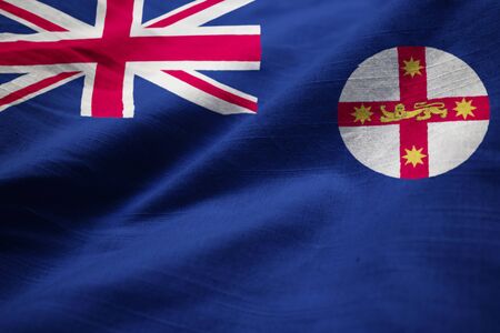 Closeup of Ruffled New South Wales Flag, New South Wales Flag Blowing in Windの写真素材