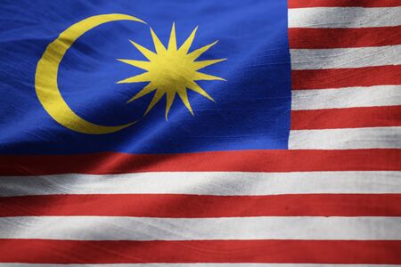 Closeup of Ruffled Malaysia Flag, Malaysia Flag Blowing in Windの写真素材