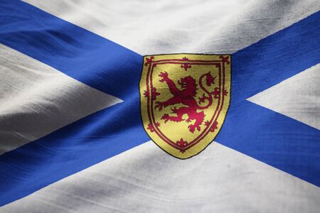 Closeup of Ruffled Nova Scotia Flag, Nova Scotia Flag Blowing in Windの写真素材