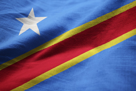 Closeup of Ruffled Democratic Republic of the Congo Flag, Democratic Republic of the Congo Flag Blowing in Windの写真素材
