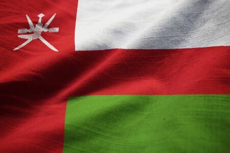 Closeup of Ruffled Oman Flag, Oman Flag Blowing in Windの写真素材