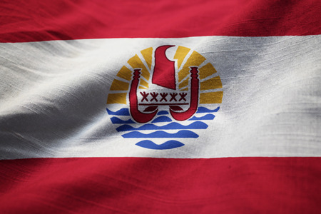 Closeup of Ruffled French Polynesia Flag, French Polynesia Flag Blowing in Windの写真素材