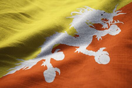 Closeup of Ruffled Bhutan Flag, Bhutan Flag Blowing in Windの写真素材