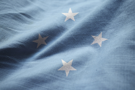 Closeup of Ruffled Micronesia Flag, Micronesia Flag Blowing in Windの写真素材