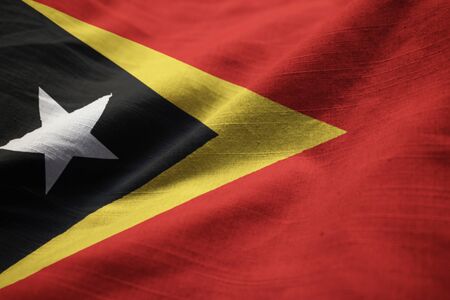 Closeup of Ruffled East Timor Flag, East Timor Flag Blowing in Windの写真素材