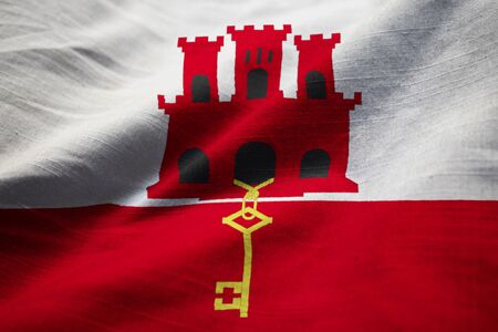 Closeup of Ruffled Gibraltar Flag, Gibraltar Flag Blowing in Windの写真素材