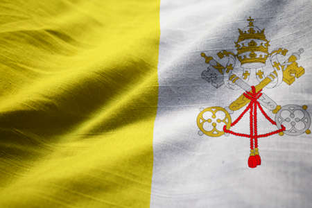 Closeup of Ruffled Vatican City Flag, Vatican City Flag Blowing in Windの写真素材