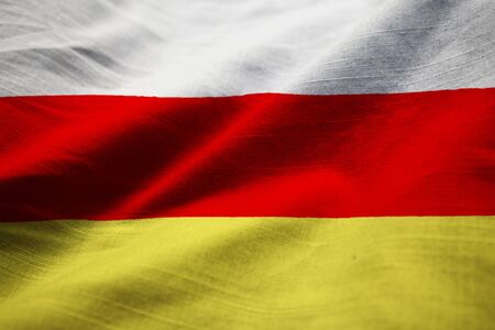 Closeup of Ruffled South Ossetia Flag, South Ossetia Flag Blowing in Windの写真素材