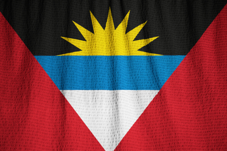 Closeup of Ruffled Antigua and Barbuda Flag, Antigua and Barbuda Flag Blowing in Windの写真素材