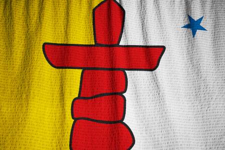 Closeup of Ruffled Nunavut Flag, Nunavut Flag Blowing in Windの写真素材