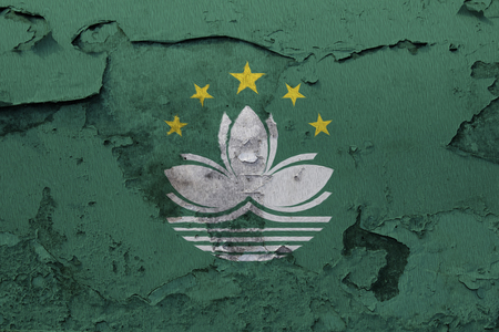 Painted national flag of Macau on a concrete wallの写真素材