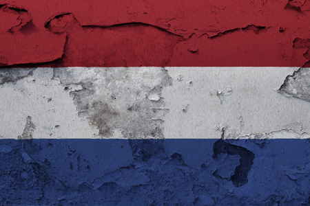 Painted national flag of Netherlands on a concrete wallの写真素材