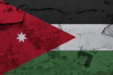Painted national flag of  Jordan on a concrete wallの写真素材