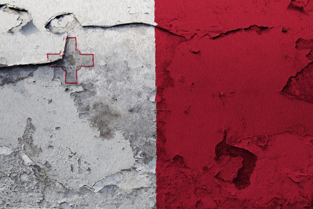 Painted national flag of Malta on a concrete wallの写真素材