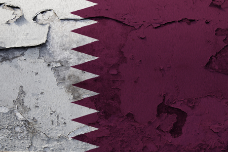 Painted national flag of Qatar on a concrete wallの写真素材