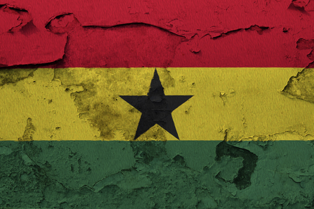 Painted national flag of Ghana on a concrete wallの写真素材