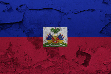Painted national flag of Haiti on a concrete wallの写真素材