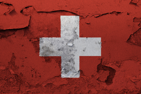 Painted national flag of Switzerland on a concrete wallの写真素材