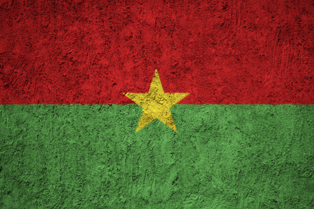 Burkina Faso flag on the grunge concrete wallの写真素材