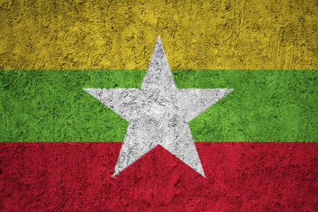 Myanmar flag on the grunge concrete wallの写真素材