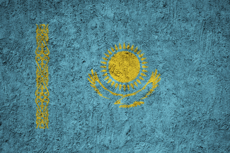 Kazakhstan flag on the grunge concrete wallの写真素材