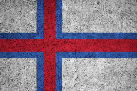 Faroe Islands flag on the grunge concrete wallの写真素材