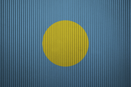 Painted national flag of Palau on a concrete wallの写真素材