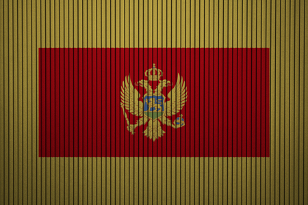 Painted national flag of Montenegro on a concrete wallの写真素材