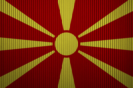 Painted national flag of Macedonia on a concrete wallの写真素材