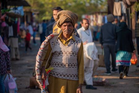 Islamabad, Islamabad Capital Territory, Pakistan - February 02, 2020, A man is looking for a customer in the vegetable market.のeditorial素材