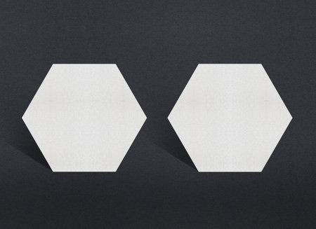 Blank white Business card mockup stacks at grey textured paper background.の写真素材