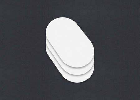 Blank white Business card mockup stacks at grey textured paper background.の写真素材