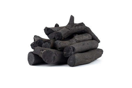 Natural wood charcoal isolated on white background. Pile of coal isolated on white background.の写真素材
