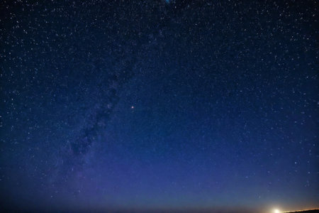 Milky Way and stars in the night sky, beautiful photo digital pictureの素材