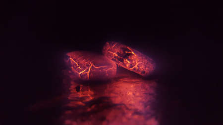 Burning lava on black background.の写真素材