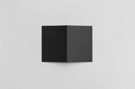 Black A6 Bi-Fold / Half-Fold Brochure Mock-Upの写真素材