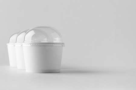 White ice cream paper cup mock-up with plastic lid.の写真素材