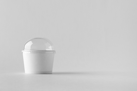 White ice cream paper cup mock-up with plastic lid.の写真素材